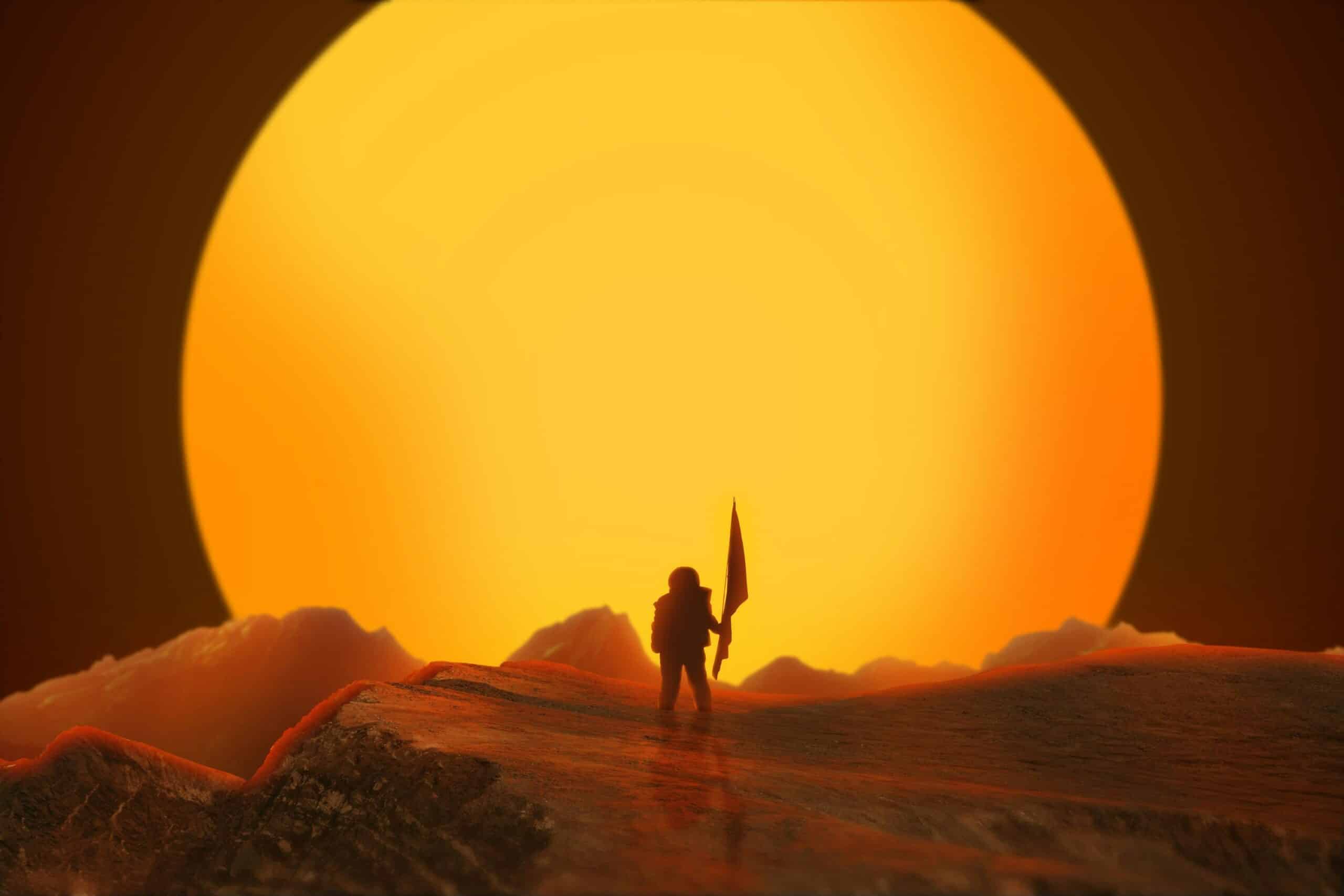 astronaut met vlag in zijn hand op mars